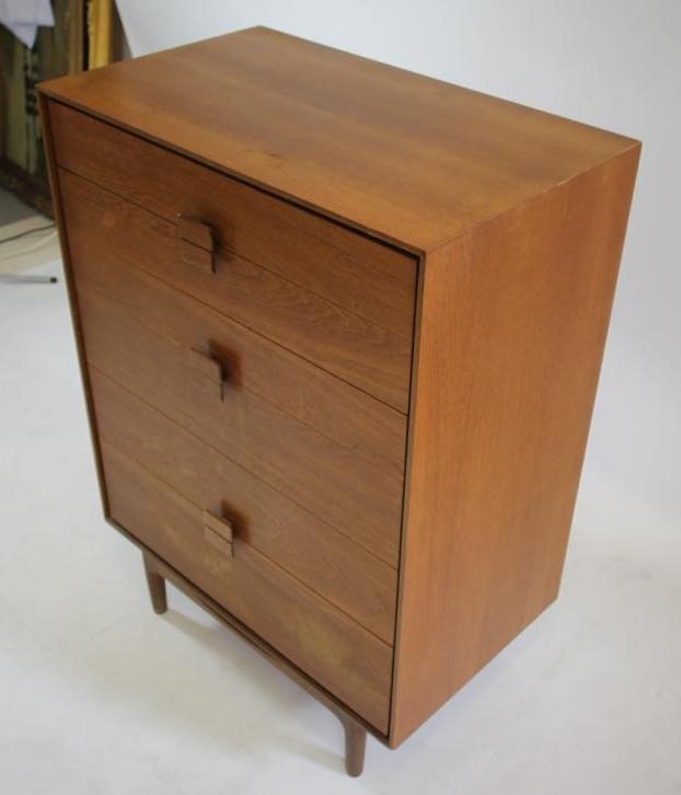 A KOFAD LARSEN G-PLAN TEAK CHEST of six graduated drawers with protruding oblong wooden handles Image