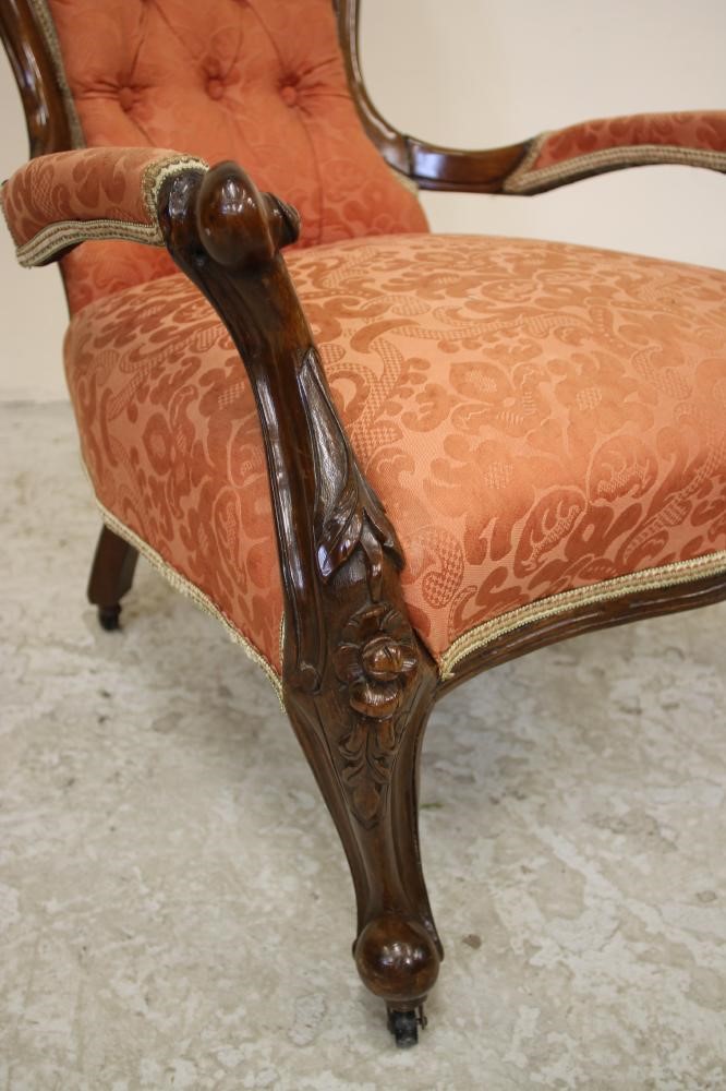 A VICTORIAN WALNUT FRAMED SALON CHAIR of spoonback form Image