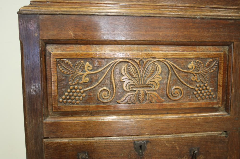 A GEORGE III OAK LIVERY CUPBOARD Image