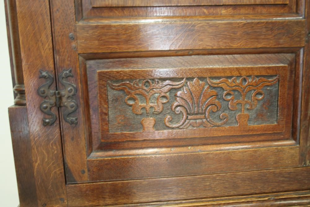 A GEORGE III OAK LIVERY CUPBOARD Image