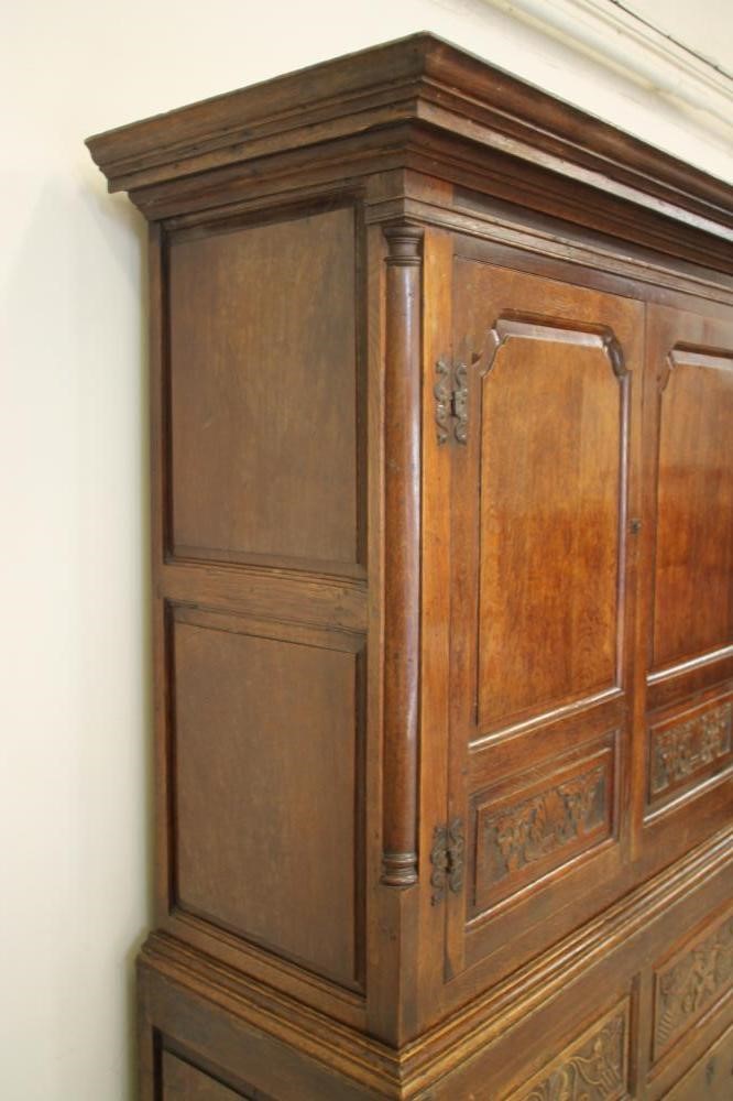 A GEORGE III OAK LIVERY CUPBOARD Image