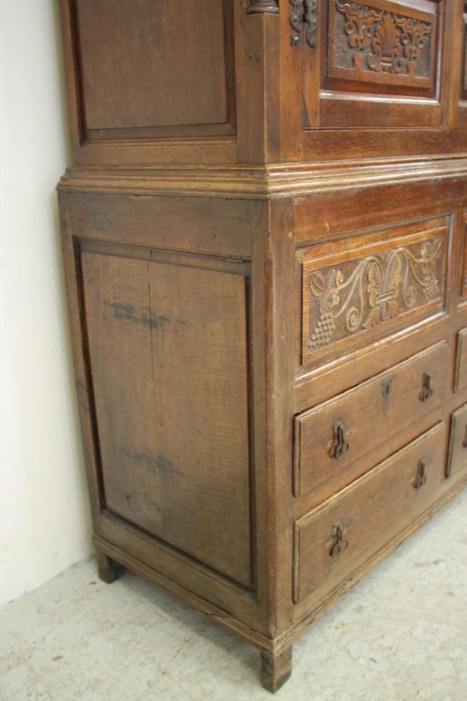 A GEORGE III OAK LIVERY CUPBOARD Image