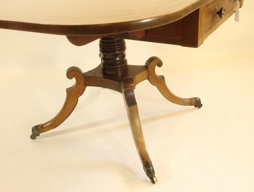 A REGENCY MAHOGANY PEMBROKE TABLE Image