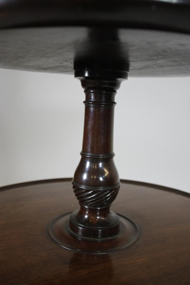 A GEORGE III MAHOGANY DUMB WAITER of three tier form with reeded edged trays Image