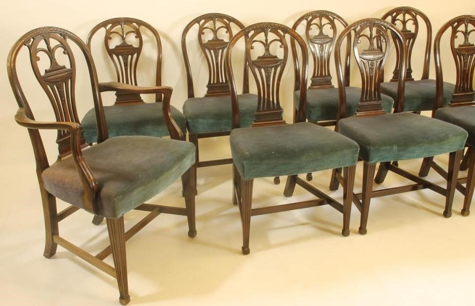 A SET OF EIGHT VICTORIAN MAHOGANY DINING CHAIRS of Georgian design and including an elbow chair Image