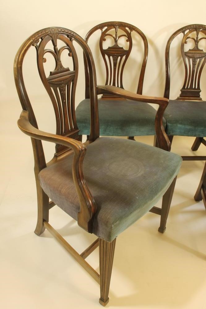 A SET OF EIGHT VICTORIAN MAHOGANY DINING CHAIRS of Georgian design and including an elbow chair Image