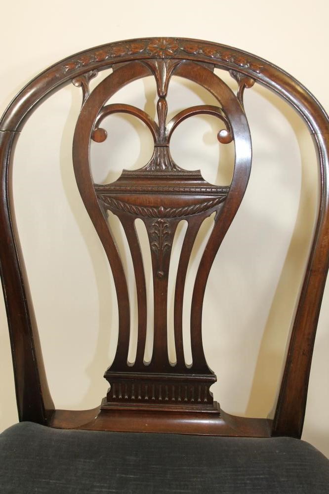 A SET OF EIGHT VICTORIAN MAHOGANY DINING CHAIRS of Georgian design and including an elbow chair Image