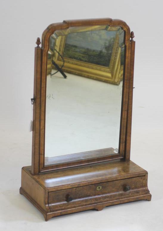 A GEORGIAN WALNUT AND FEATHER BANDED TOILET MIRROR Image