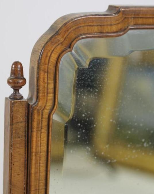 A GEORGIAN WALNUT AND FEATHER BANDED TOILET MIRROR Image