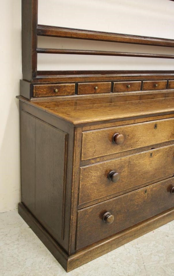 AN OAK ENCLOSED DRESSER Image