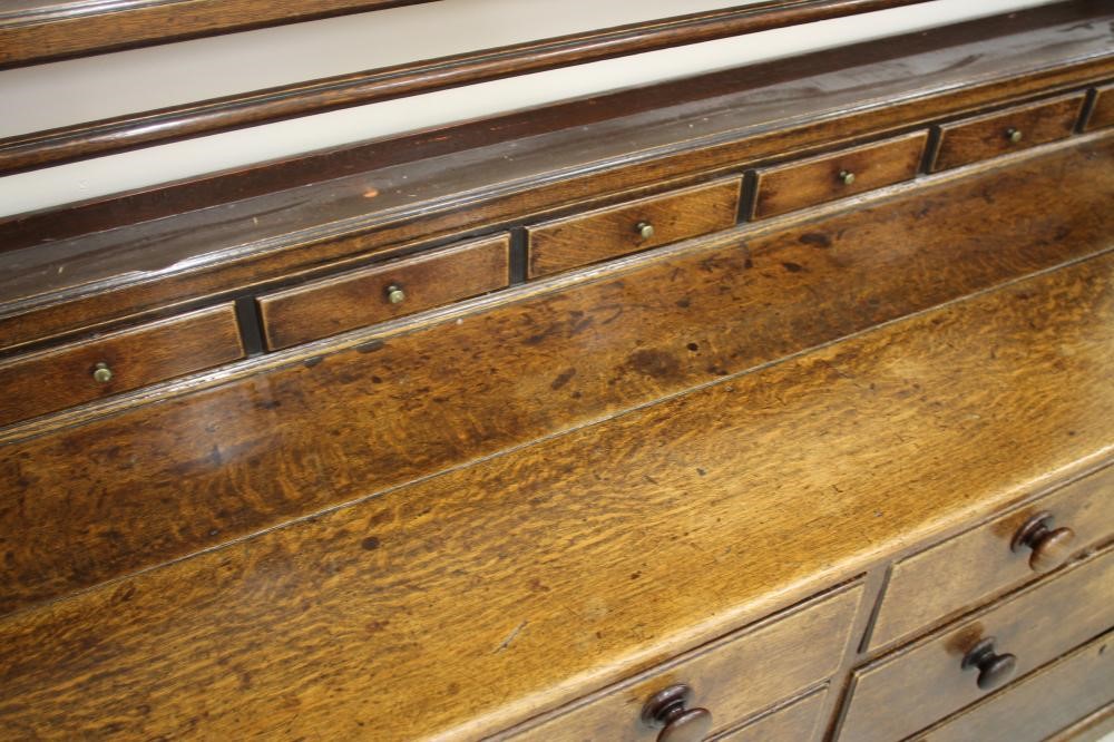 AN OAK ENCLOSED DRESSER Image