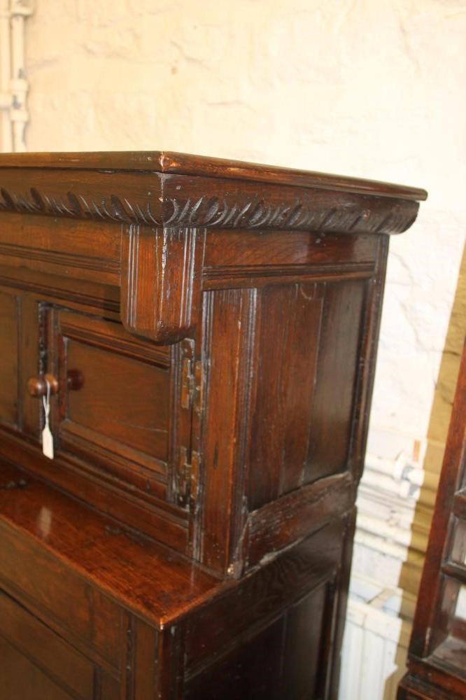 AN OAK PRESS CUPBOARD Image