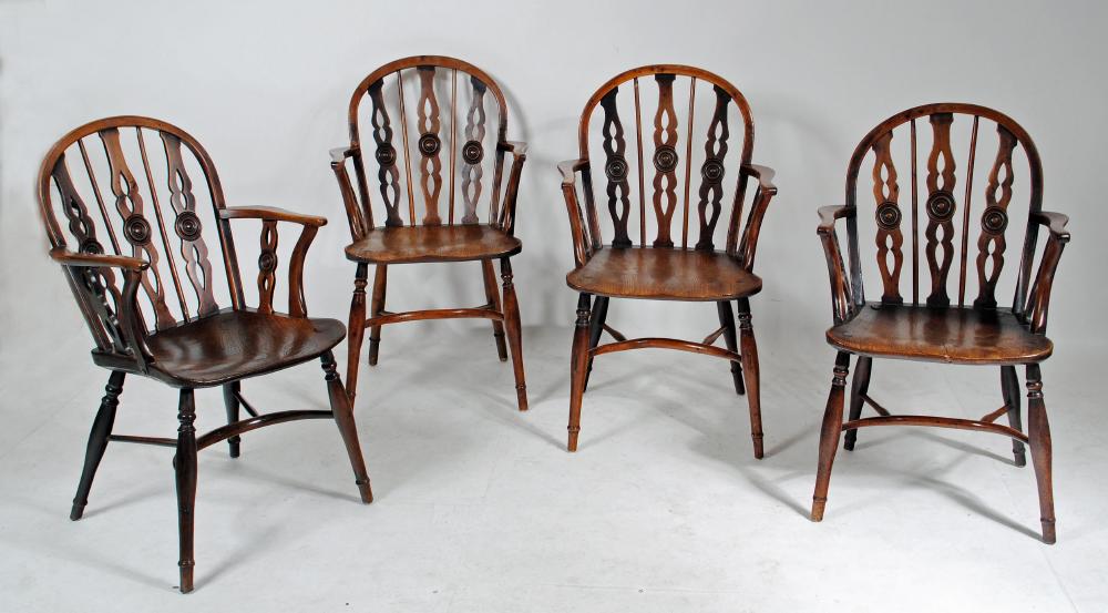 A SET OF FOUR YEW WINDSOR ARMCHAIRS Image