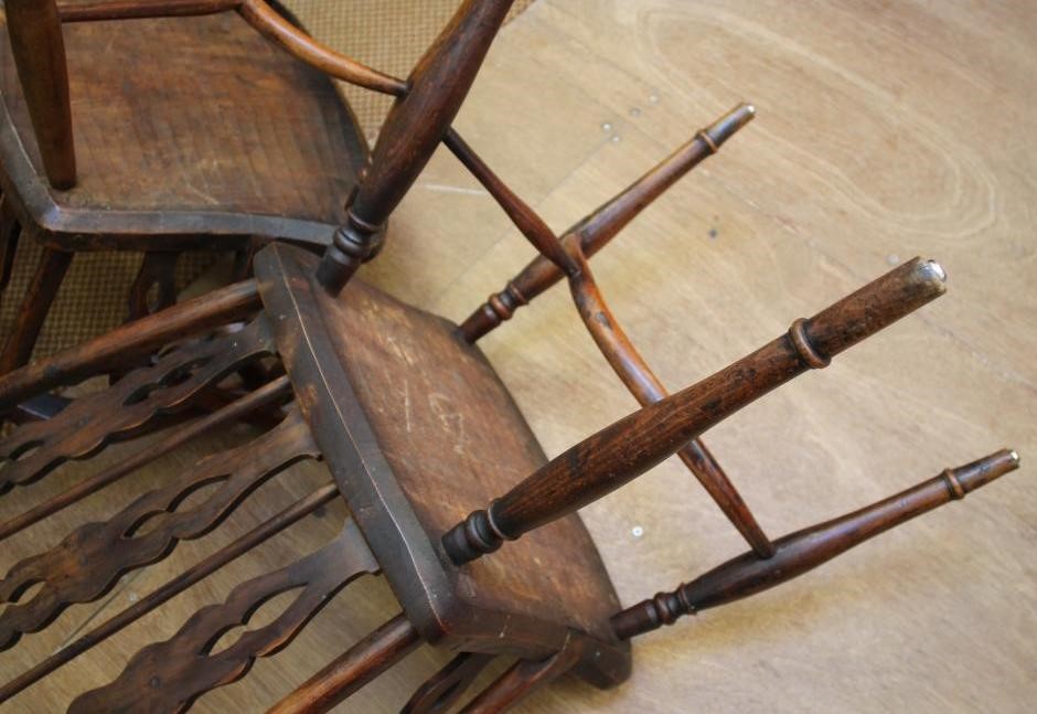 A SET OF FOUR YEW WINDSOR ARMCHAIRS Image