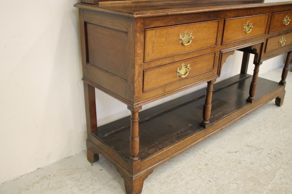 A VICTORIAN OAK DRESSER Image