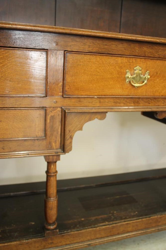 A VICTORIAN OAK DRESSER Image