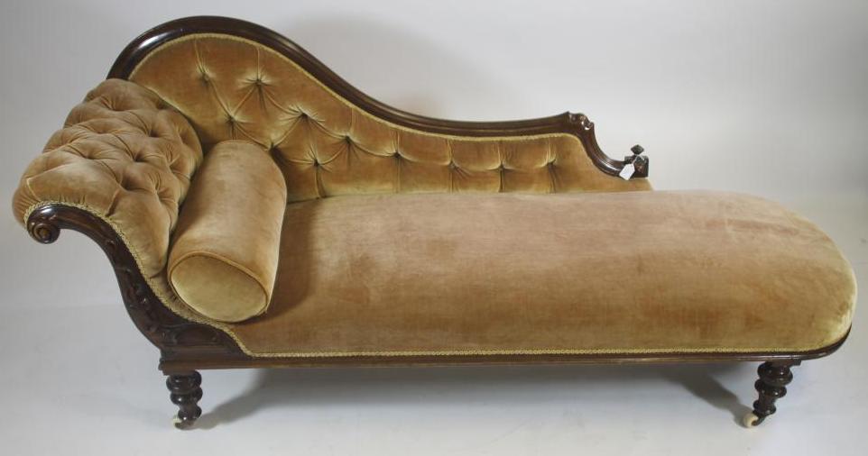 A VICTORIAN WALNUT FRAMED CHAISE LONGUE Image