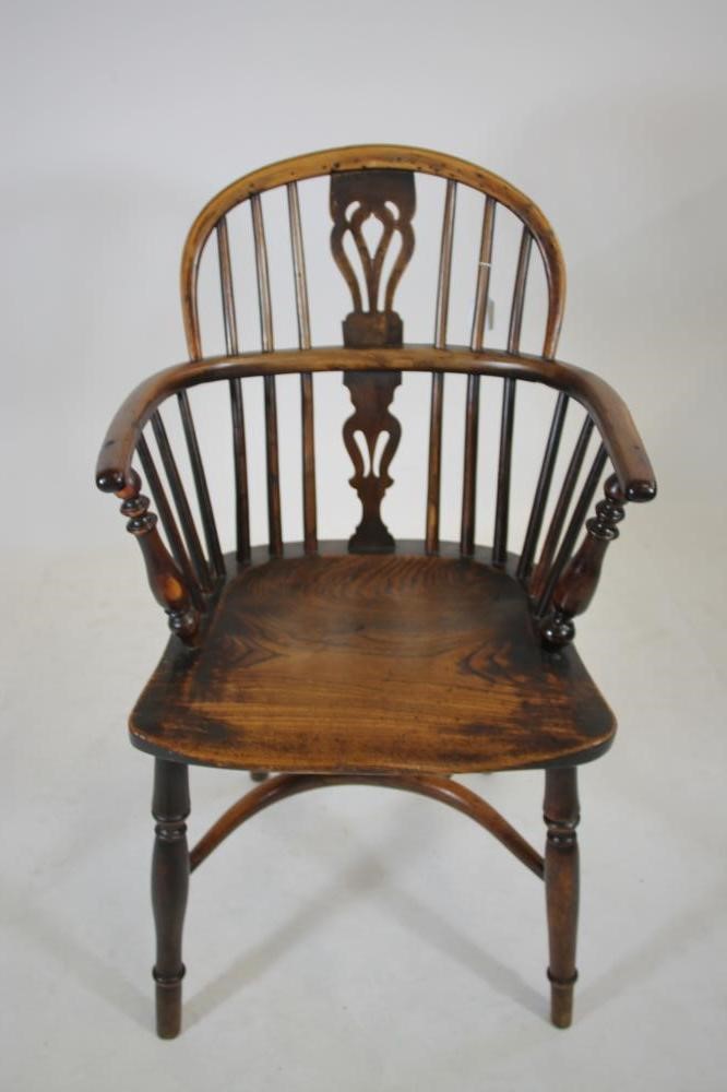 A YEW WINDSOR ARMCHAIR Image