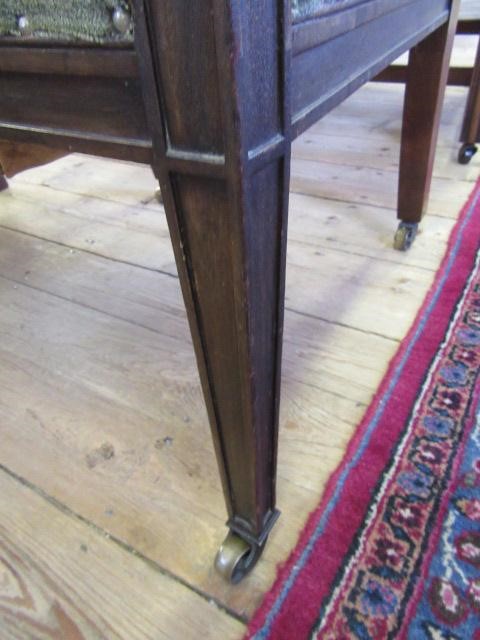 A REGENCY MAHOGANY ELBOW CHAIR upholstered in green velvet Image