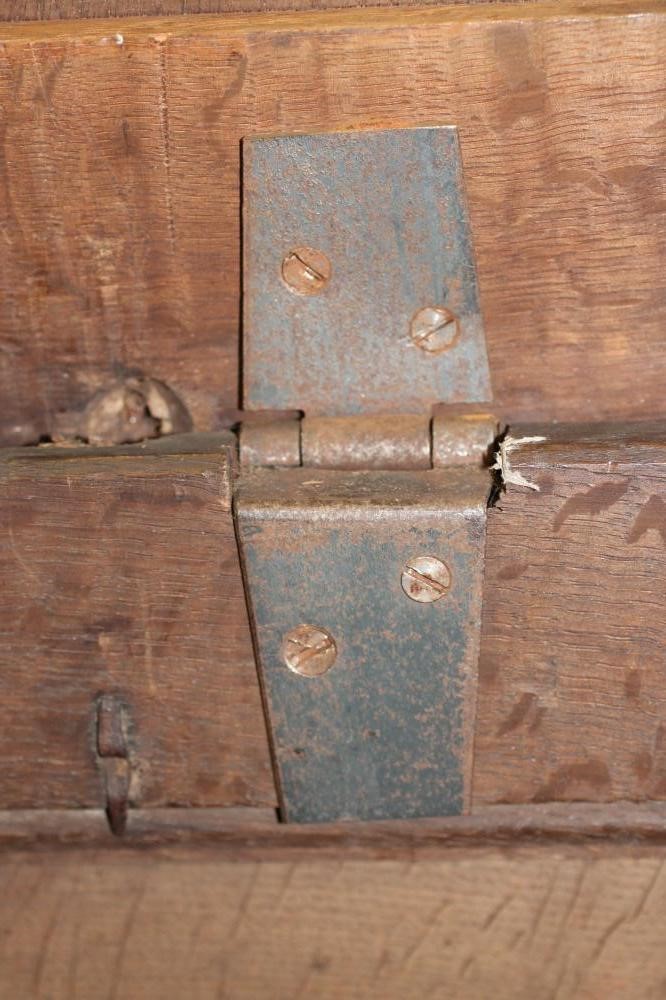 AN OAK PANELLED COFFER Image