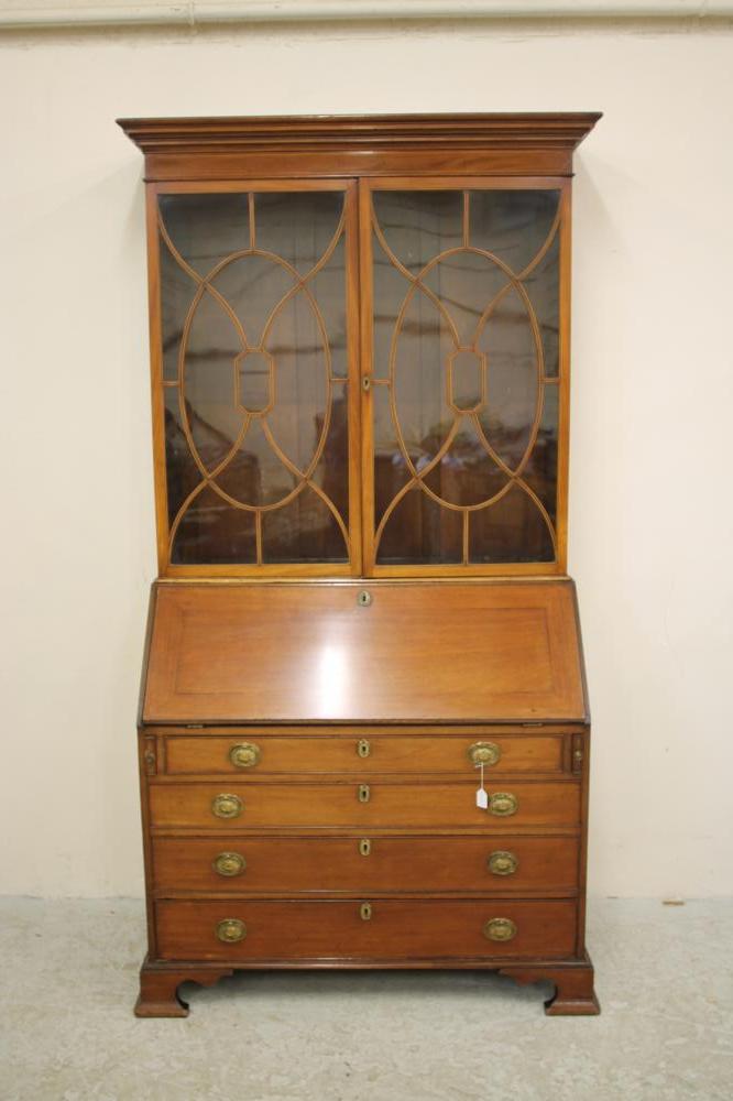 A GEORGE III MAHOGANY BUREAU BOOKCASE Image