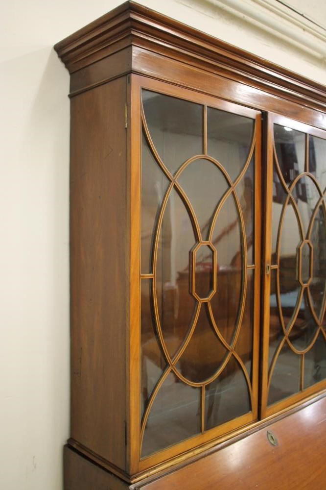 A GEORGE III MAHOGANY BUREAU BOOKCASE Image