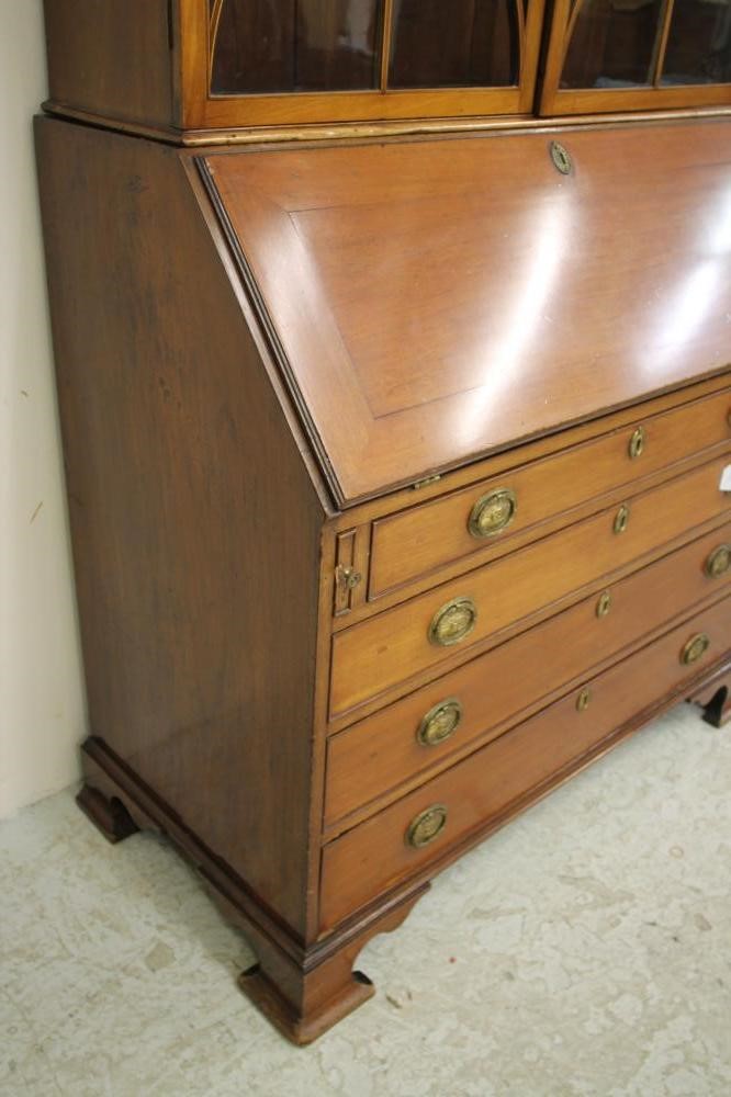 A GEORGE III MAHOGANY BUREAU BOOKCASE Image