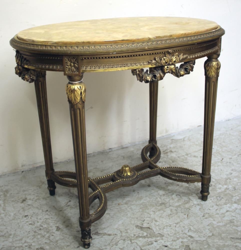 A GILDED SATINWOOD OCCASIONAL TABLE Image