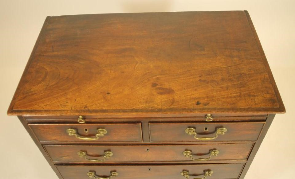 A SMALL MAHOGANY CHEST Image