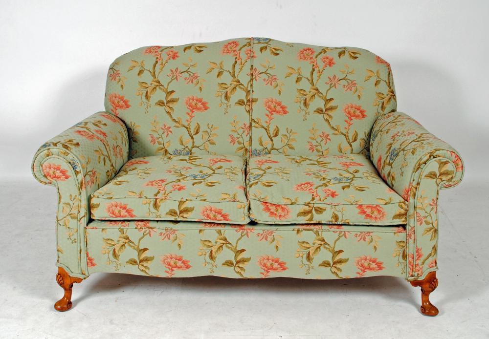 A WALNUT FRAMED SOFA Image