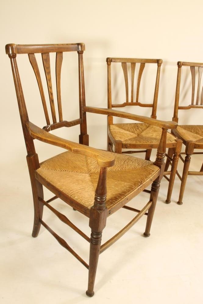 A SET OF SIX ARTS AND CRAFTS ELM RUSH SEATED DINING CHAIRS Image