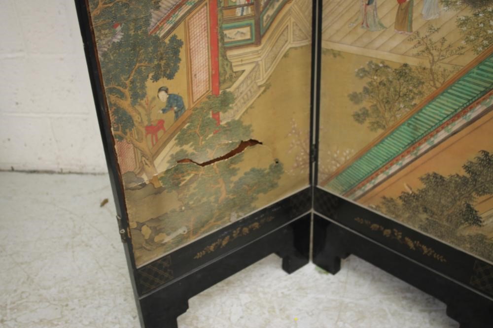 A CHINESE BLACK LACQUERED FOLDING ROOM SCREEN Image