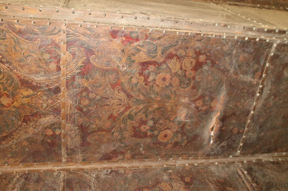 A FOUR FOLD EMBOSSED LEATHER ROOM SCREEN Image