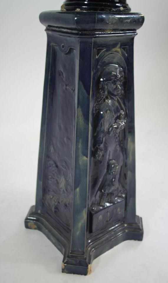 A CONTINENTAL HEAVY EARTHENWARE JARDINIERE AND STAND Image