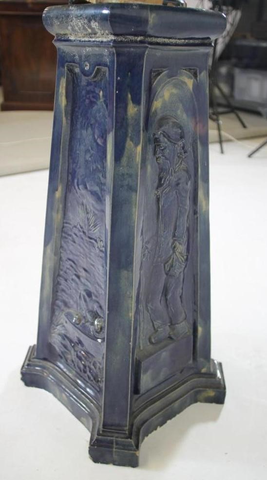 A CONTINENTAL HEAVY EARTHENWARE JARDINIERE AND STAND Image