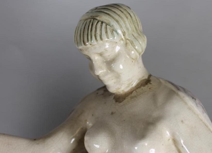 AN ART DECO EARTHENWARE FIGURE Image