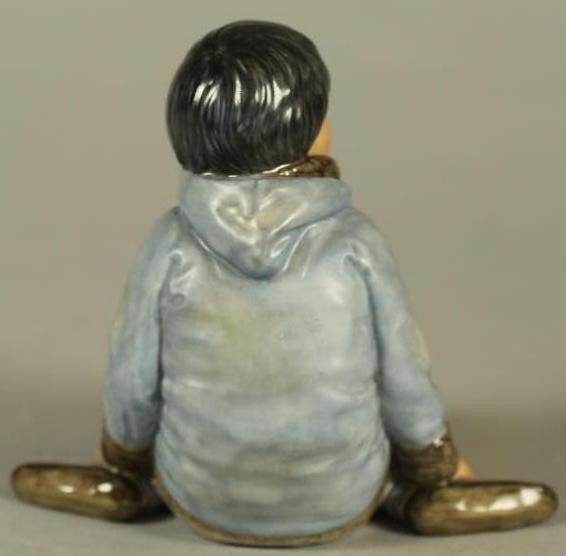 A ROYAL COPENHAGEN PORCELAIN FIGURE Image