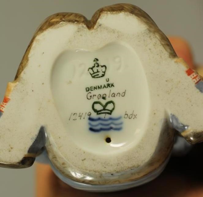 A ROYAL COPENHAGEN PORCELAIN FIGURE Image