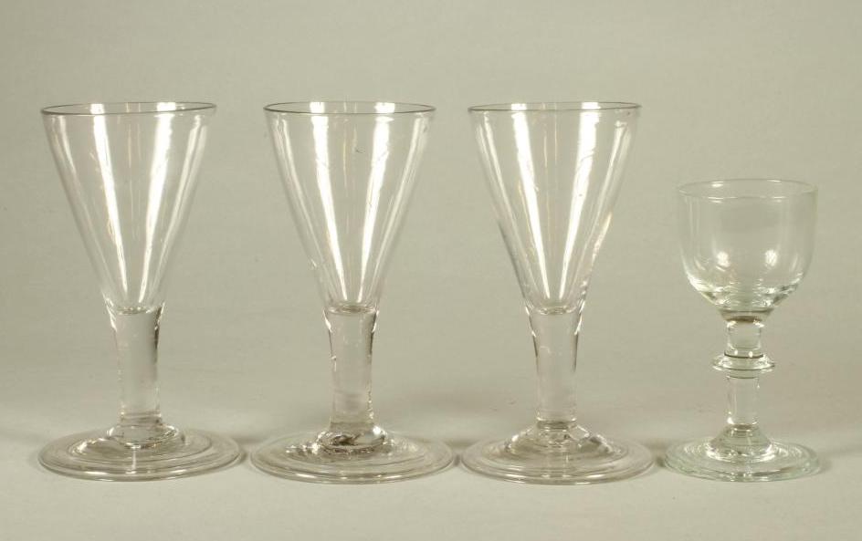 A SET OF THREE WINE GLASSES Image