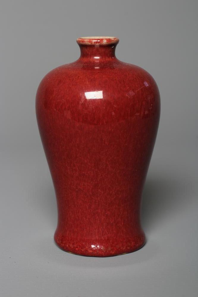 A CHINESE STONEWARE RED FLAMBE GLAZED MEIPING VASE, unmarked, 5" high (Est. plus 24% premium inc. Image