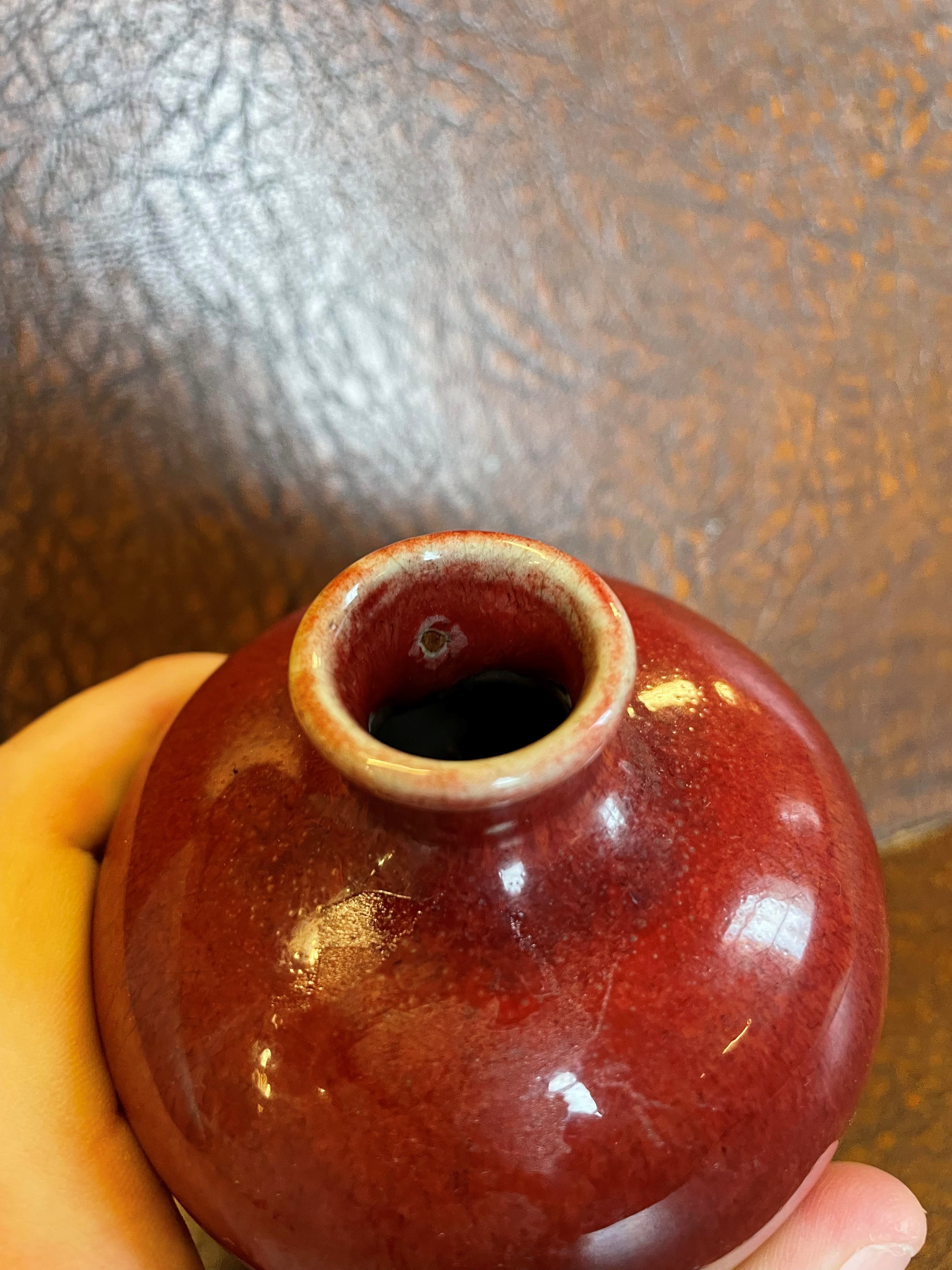 A CHINESE STONEWARE RED FLAMBE GLAZED MEIPING VASE, unmarked, 5" high (Est. plus 24% premium inc. Image