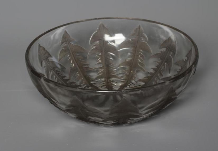 A LALIQUE PISSENLIT BOWL, pre 1945, the exterior with sepia tinted incuse moulded Dandelion leaves, Image