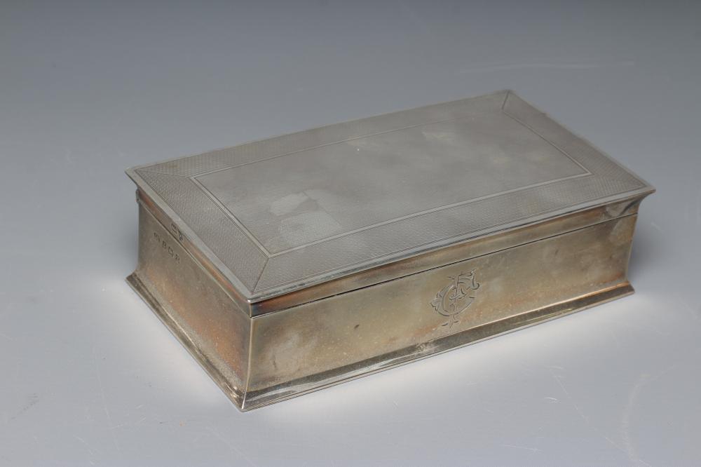 A GEORGE V SILVER OBLONG CIGARETTE BOX by George Unite & Sons Image