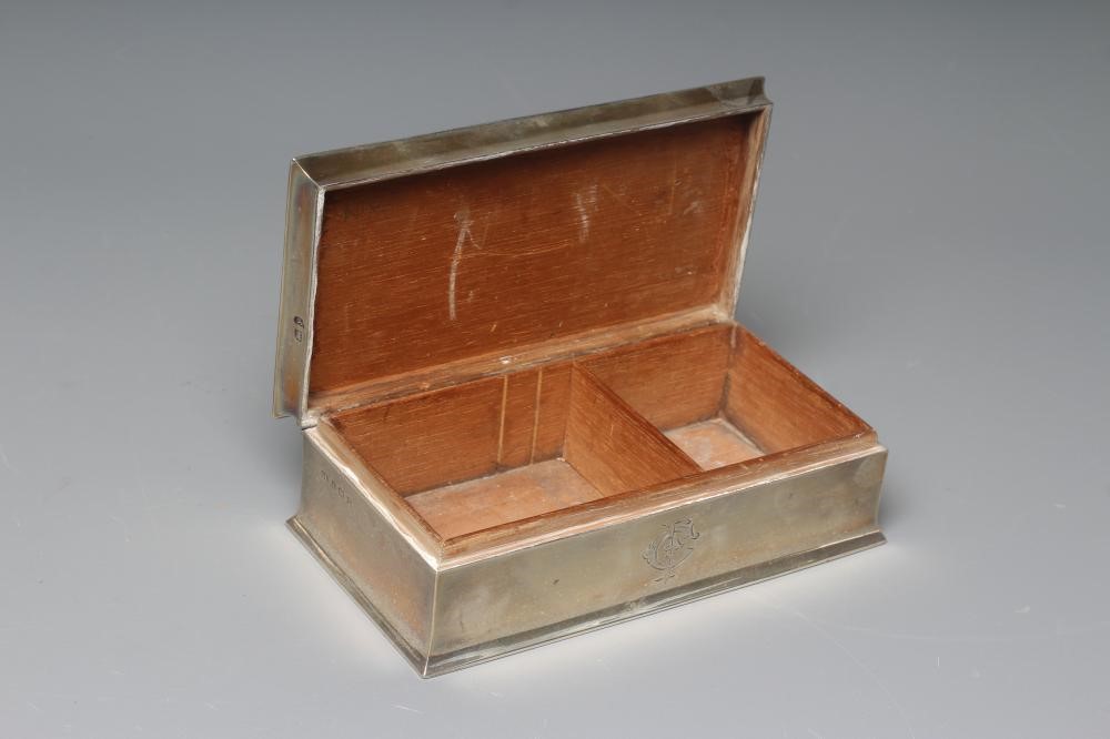 A GEORGE V SILVER OBLONG CIGARETTE BOX by George Unite & Sons Image