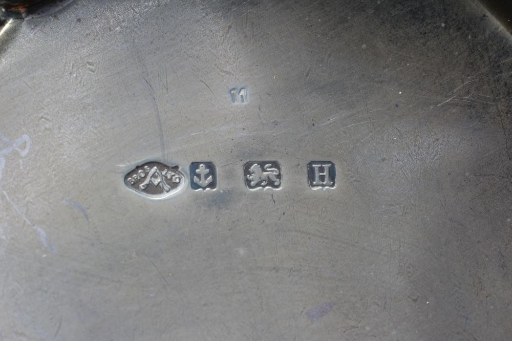 A GEORGE V SILVER CENTRE BOWL by Adie Brothers Ltd. Image