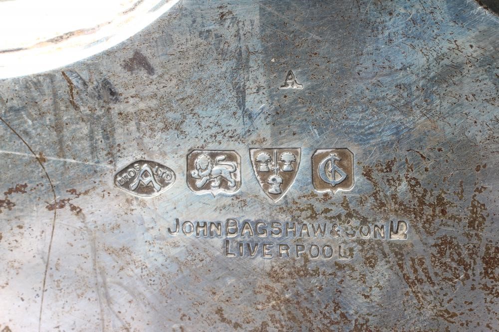 A GEORGE V SILVER SALVER by Adie Brothers Ltd., Chester 1932, of shaped circular form with pie crust Image