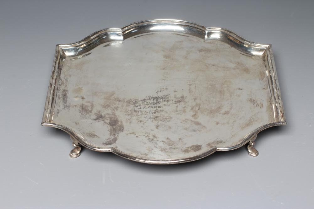A GEORGE V SILVER SALVER by Josiah Williams & Co., London 1926, of shaped square form with lobed Image