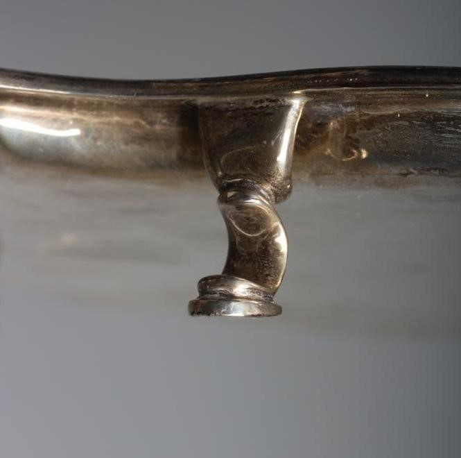 A GEORGE V SILVER SALVER by Josiah Williams & Co., London 1926, of shaped square form with lobed Image