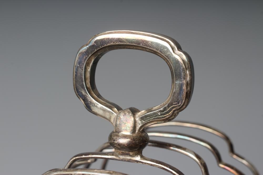 AN ELIZABETH II SILVER SEVEN BAR TOASTRACK by Walker & Hall Image