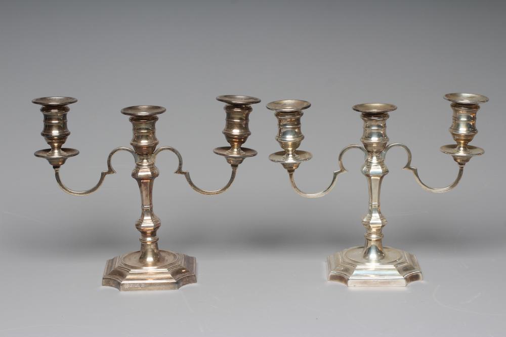 A PAIR OF ELIZABETH II TWO BRANCH THREE LIGHT CANDELABRA by Barker Ellis Silver Co. Image